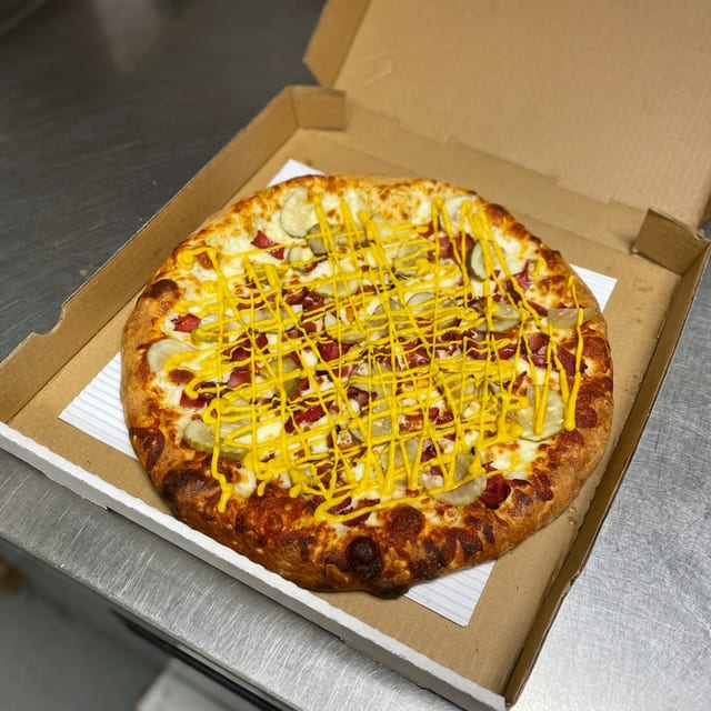 14in LARGE PASTRAMI SPECIALTY PIZZA.