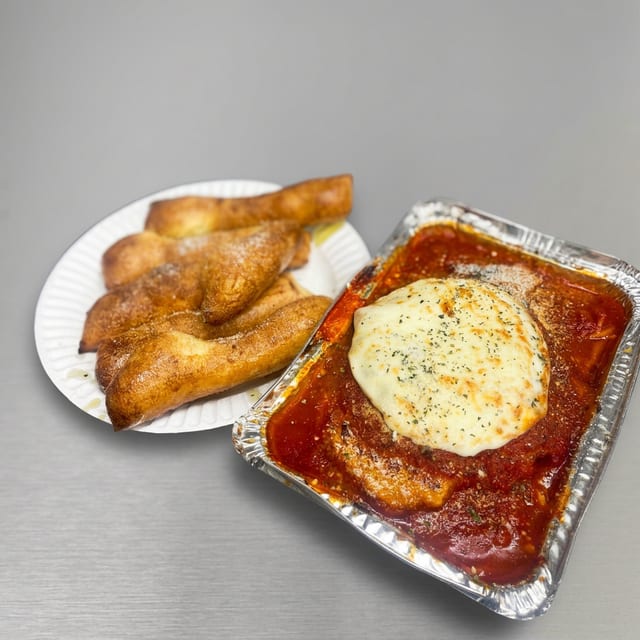 CHICKEN PARMESAN DINNER.